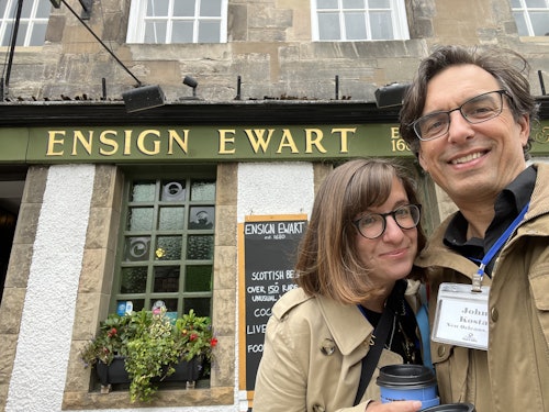 Huron's Katie and John Kosta in front of one of their favorite Edinburgh pubs