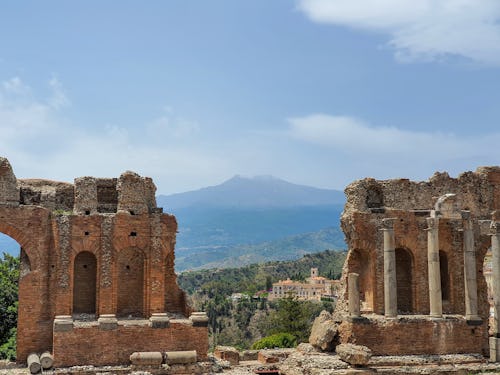 Ancient Greek Theater with Mount Etna in the background